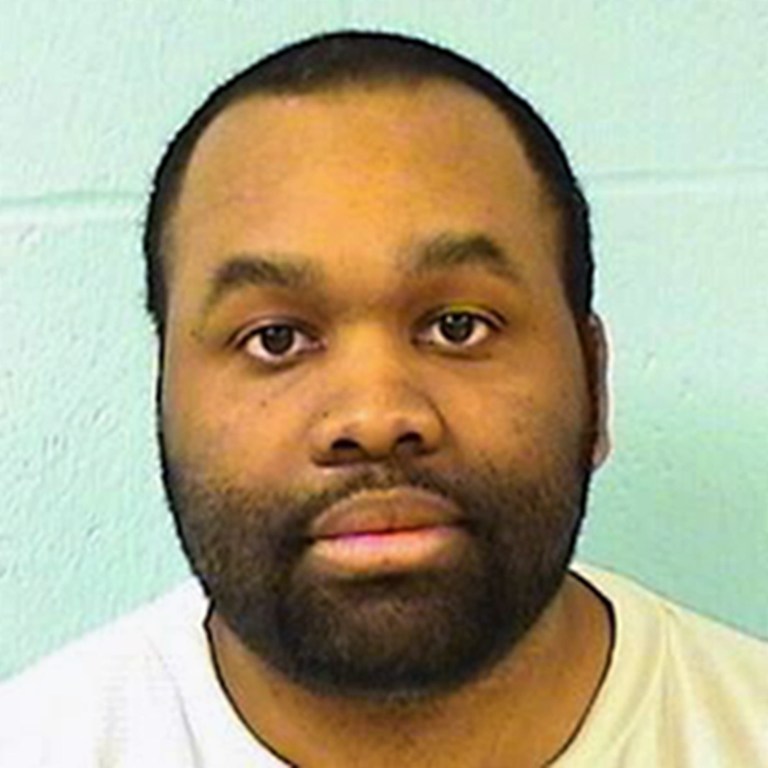 FILE - This undated file photo provided by the Illinois Department of Corrections shows James Watts, 29, of Cairo, Ill.  A federal judge on Tuesday, July 29, 2014, unsealed a warrant which describes in detail the alleged crimes of Watts who is charged with attempted armed bank robbery resulting in the deaths of two women. (AP Photo/Illinois Department of Corrections, File)
