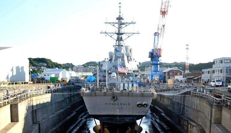 The Navy is set to relieve the two top officers and the senior enlisted sailor of the USS Fitzgerald, Cmdr. Bryce Benson, Executive Officer Cmdr. Sean Babbitt, and Master Chief Petty Officer Brice Baldwin for failure to avoid a collision with a freighter in the early morning hours of June 17 off the coast of Japan. (Spc. 1st Class Leonard Adams/U.S. Navy via AP)