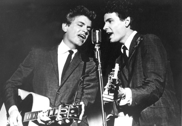 In this July 31, 1964 file photo The Everly Brothers, Phil, left, and Don, perform on stage. Everly, who with his brother Don formed an influential harmony duo that touched the hearts and sparked the imaginations of rock 'n' roll singers for decades, including the Beatles and Bob Dylan, died Jan. 3. (AP Photo, File)