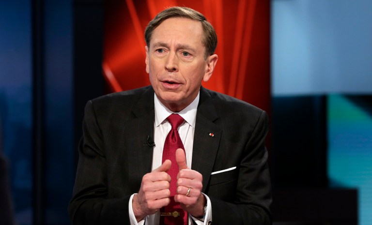 Illinois Sen. Mark Kirk said Tuesday he plans to write in former CIA Director and retired Gen. David Petraeus on the presidential ballot in November. (AP Photo/Richard Drew)