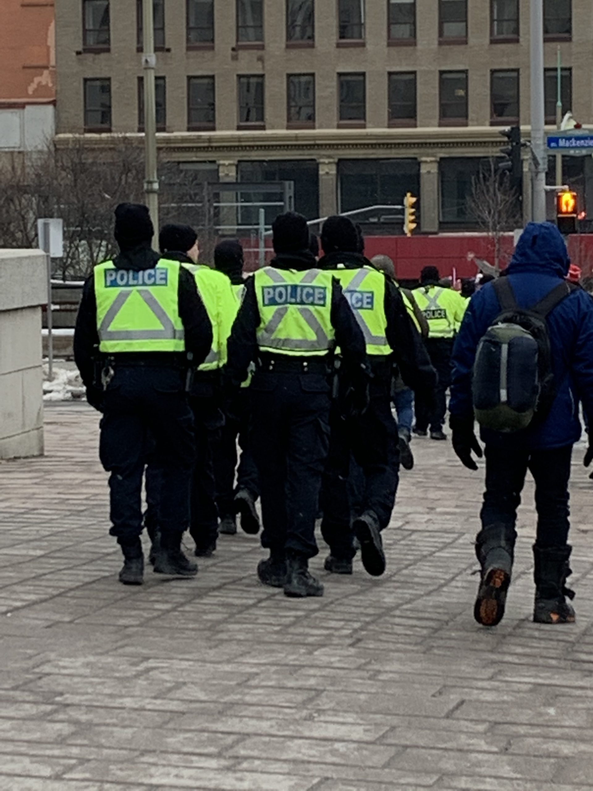 Canadian police officers walk together in downtown Ottawa, Ontario.
