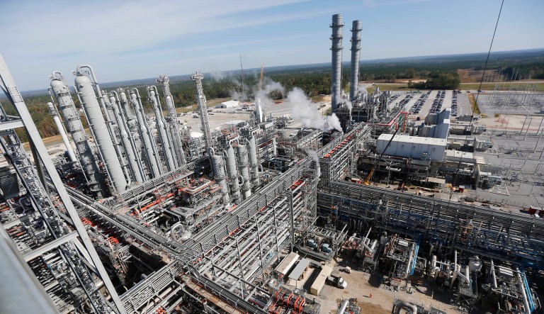 FILE - This Nov. 16, 2015 photo shows an overview of a section of the Mississippi Power Co. carbon capture plant in DeKalb, Miss. Regulators have reached a settlement with Mississippi Power Co. on how much customers should pay for a troubled $7.5 billion power plant once touted as the future of coal. The unit of Atlanta-based Southern Co. is agreeing to lower the price tag on its Kemper County power plant by $85 million, its second round of concessions in two weeks. Shareholders have already lost $6 billion.