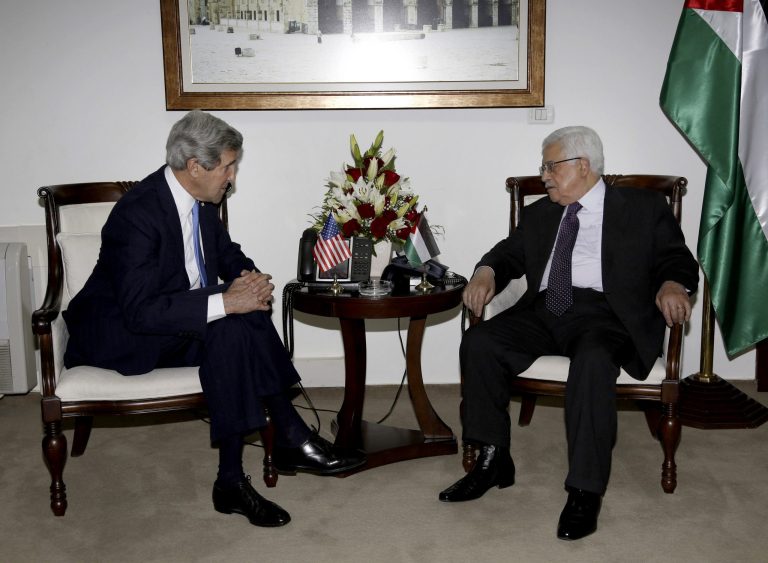 Palestinian President Mahmoud Abbas, right, meets with U.S. Secretary of State John Kerry in the West Bank city of Ramallah Sunday, April 7, 2013. (AP Photo/Mohamed Torokman, Pool)