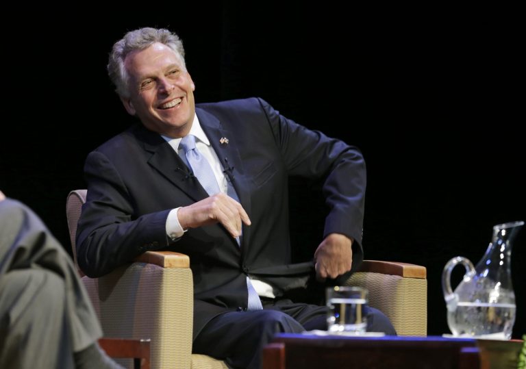 Democratic gubernatorial candidate Terry McAuliffe smiles during a forum at the University of Richmond in Richmond, Va., on Oct. 10. McAuliffe has led Republican competitor Ken Cuccinelli in polls since July. (AP Photo/Steve Helber)