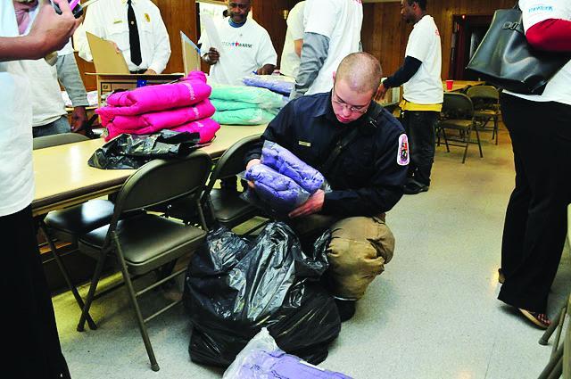 Fairfax County police officer Dan Johnson inspects trucks as part of a road safety initiative.