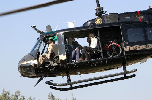 Secretary of Homeland Security John Kelly and Texas Governor Greg Abbott take off in a helicopter tour of the Texas border with Mexico Wednesday February 1, 2017 at the Texas Department of Public Safety regional headquarters in Weslaco, Texas. (photo by Nathan Lambrecht/Pool)