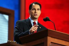 Traveling man: Wisconsin’s Scott Walker shuttles to Iowa and other battleground states to ignite bid for presidency