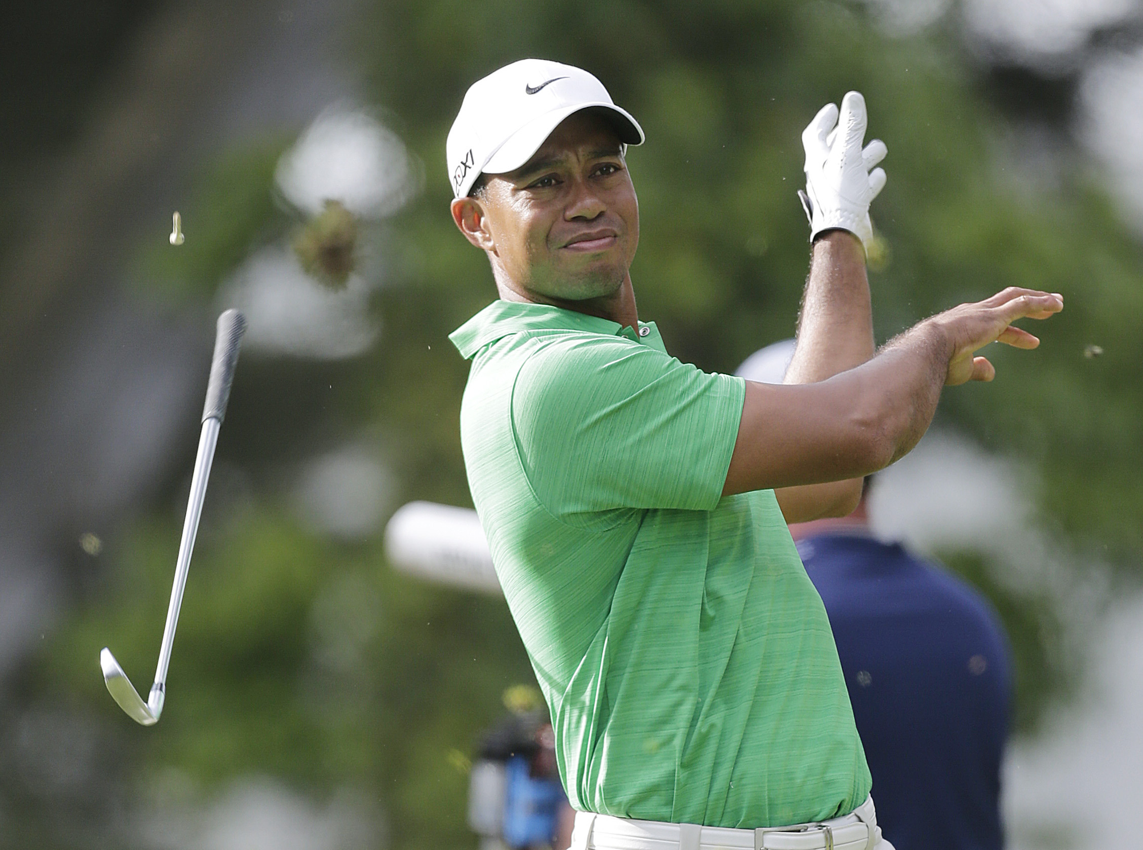 Furyk, McDowell share the lead as Tiger tumbles