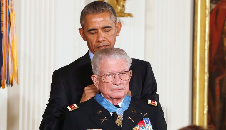 President Barack Obama presents the Medal of Honor to retired Army Lt. Col. Charles Kettles, 86, of Ypsilanti, Michigan, during a ceremony in the East Room of the White House in Washington, Monday, July 18, 2016. Kettles distinguished himself in combat operations near Duc Pho, Vietnam, and is credited with saving the lives of 40 soldiers and four of his own crew members.