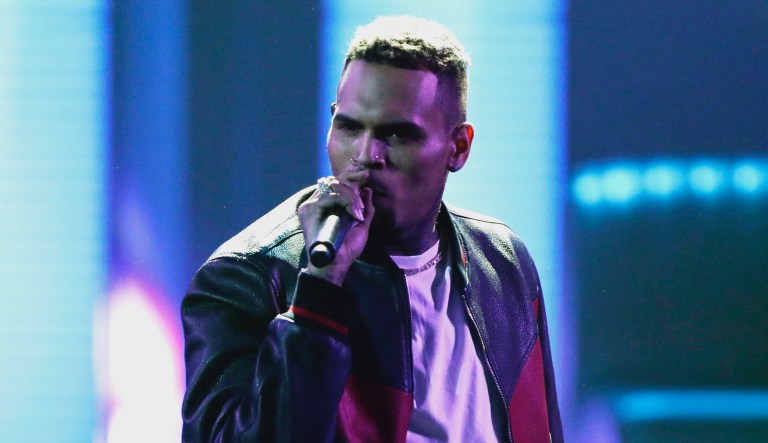FILE - In this Sunday, June 25, 2017, file photo, Chris Brown performs at the BET Awards at the Microsoft Theater in Los Angeles. Brown released a 45-song album "Heartbreak on a Full Moon" on Tuesday, Oct. 31.