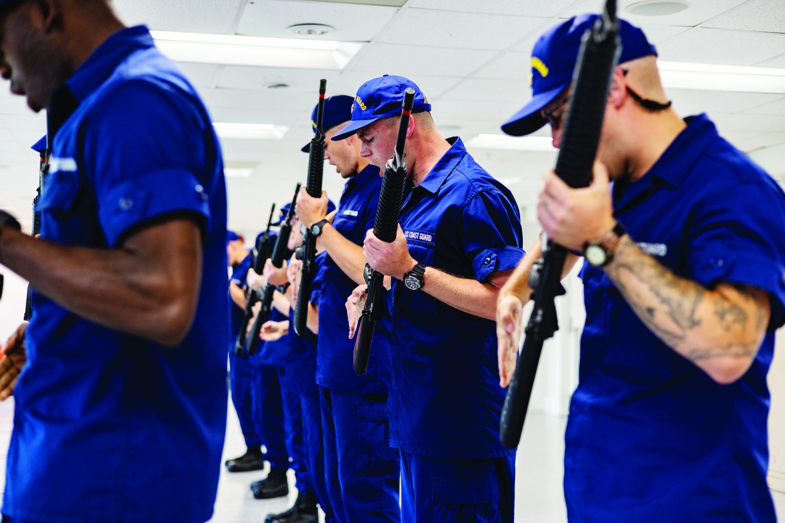 U.S. Coast Guard recruits conduct a weapons training drill at the United States Coast Guard Training Center, on Tuesday, May 16, 2024, at Cape May, New Jersey.