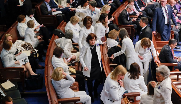 House Democratic Congresswomen, wearing white, take their seats on Capitol Hill in Washington, Tuesday, Feb. 28, 2017, before President Donald Trump's speech to a joint session of Congress.