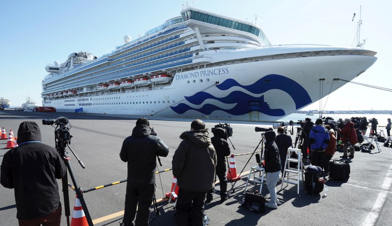 In this Feb. 9, 2020, photo, the cruise ship Diamond Princess anchors off the Yokohama Port.