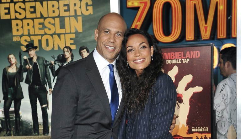Cory Booker, left, and Rosario Dawson attend the Los Angeles premiere of "Zombieland: Double Tap" at the Regency Village Theatre on Thursday, Oct. 10, 2019, in Los Angeles.