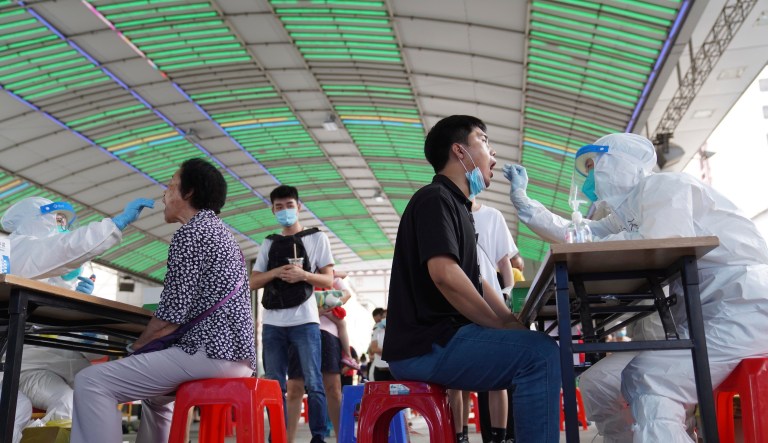 China won’t report asymptomatic COVID cases in further shift