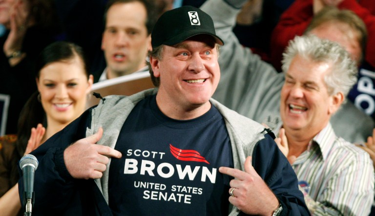 FILE - In this Jan. 17, 2010 file photo, former Boston Red Sox pitcher Curt Schilling shows his support for Massachusetts State Senator Scott Brown at a rally in Worcester, Mass., during a campaign rally to fill the U.S. Senate seat left empty by the death of Sen. Edward M. Kennedy, D-Mass. Schilling announced plans on Tuesday, Oct. 18, 2016 during a radio interview at Rhode Island's WPRO-AM, to run in 2018 against Sen. Elizabeth Warren, D-Mass., if his wife agrees. Schilling also said he's ultimately responsible for the collapse of his 38 Studios video game company in Rhode Island. 
