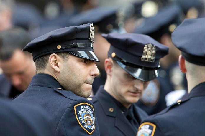 An officer angry about press bias is much more likely to report frustration and even anger with his job. (AP Photo/Mary Altaffer)