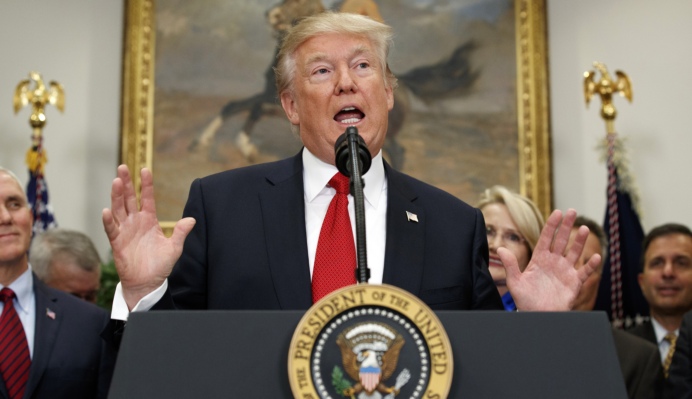 Trump signs executive order to loosen Obamacare rules