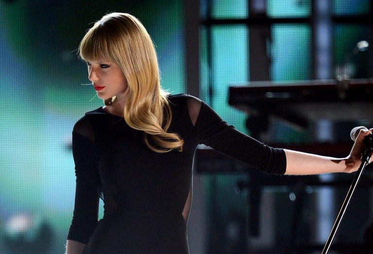 LAS VEGAS, NV - APRIL 08:  Singer Taylor Swift performs onstage during Tim McGraw's Superstar Summer Night presented by the Academy of Country Music at the MGM Grand Garden Arena on April 8, 2013 in Las Vegas, Nevada.  (Photo by Ethan Miller/Getty Images)