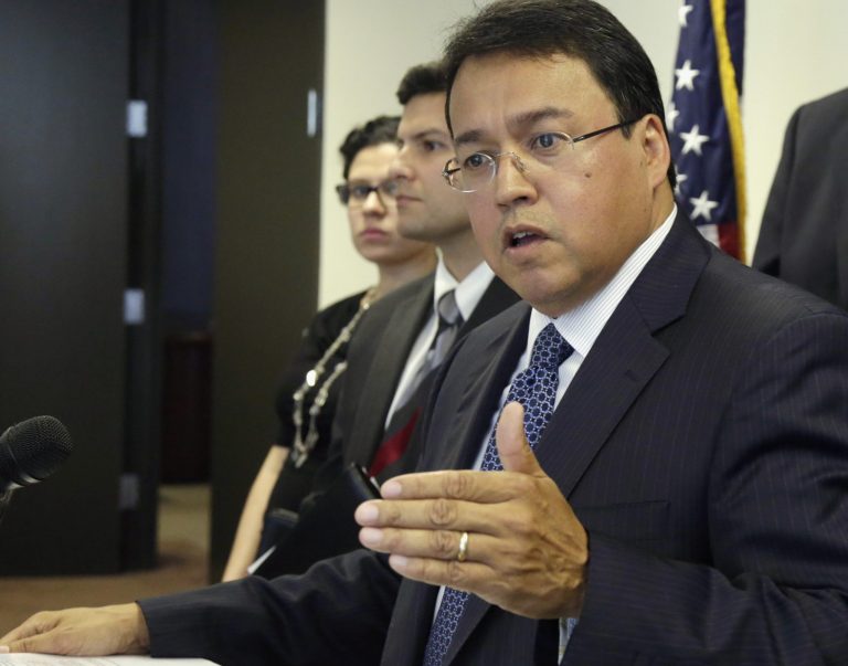 In this Friday, Aug. 22, 2014 photo, Illinois' Executive Inspector General Ricardo Meza speaks at a news conference in Chicago to report that the Illinois Department of Transportation circumvented rules devised to keep politics out of state jobs and improperly hired more than 250 people in the last decade, accelerating the practice under Democratic Gov. Pat Quinn. (AP Photo/M. Spencer Green)
