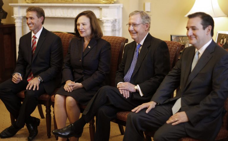 Senate Minority Leader Mitch McConnell of Ky., second from right, meets with newly elected GOP senators.. From left are, Sen-elect Jeff Flake, R-Ariz., Sen-elect Deb Fischer, R-Neb, McConnell, and Sen-elect Ted Cruz, R-Texas. (AP Photo)