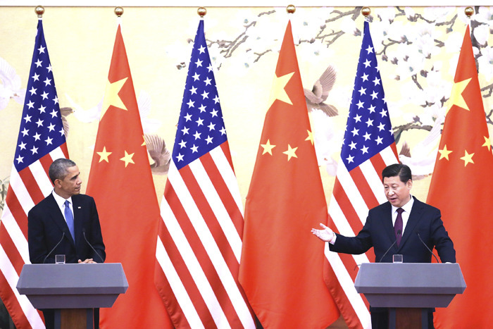 U.S. President Obama, left, and Chinese President Xi Jinping attend a press conference at the Great Hall of People on November 12, 2014 in Beijing, China. (Feng Li/Getty Images)