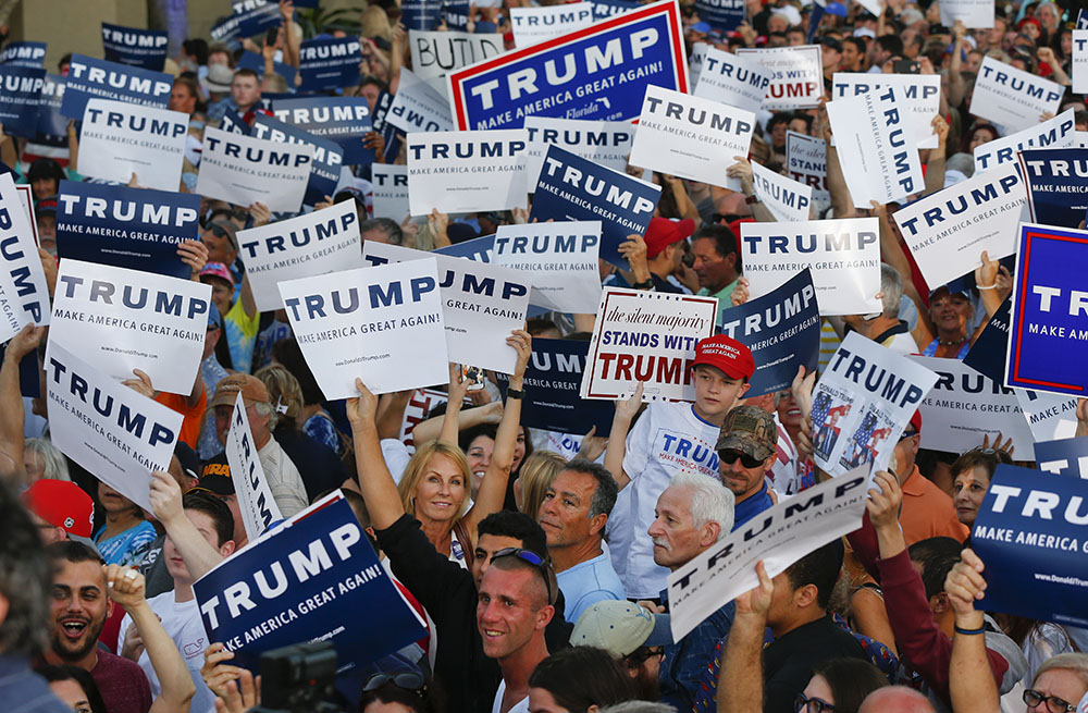 Trump aides and supporters try to spin riot warnings