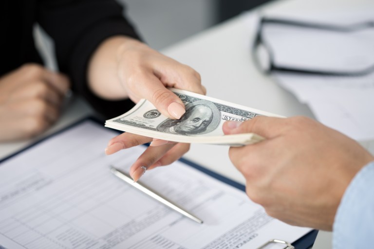 Companies are offering cash payments typically worth less than the long-term value of federal employees' annuities, and they're often charging high interest rates and fees, OPM warned.