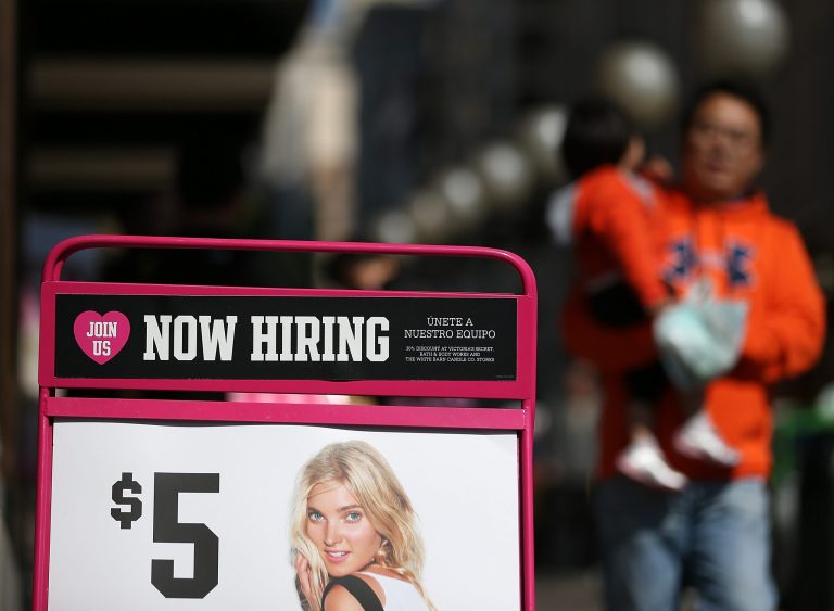 A 'now hiring' sign is posted in front of a clothing store on September 27, 2012 in San Francisco, California. (Photo by Justin Sullivan/Getty Images)