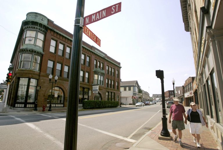   FILE - In this July 25, 2007, file photo, pedestrians stroll through downtown Middleborough, Mass. Officials, fed up with public swearing, are scheduled to vote at a town meeting Monday night, June 11, 2012, on whether to impose a $20 fine for public swearing. The measure could raise questions about First Amendment rights, but state law does allow towns to enforce local laws that give police the power to arrest anyone who 