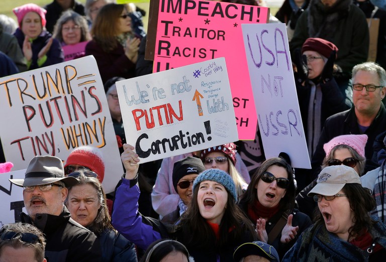 A new survey shows most people are either somewhat or very worried about President Trump's alleged ties to Russia. (AP Photo/Steven Senne)