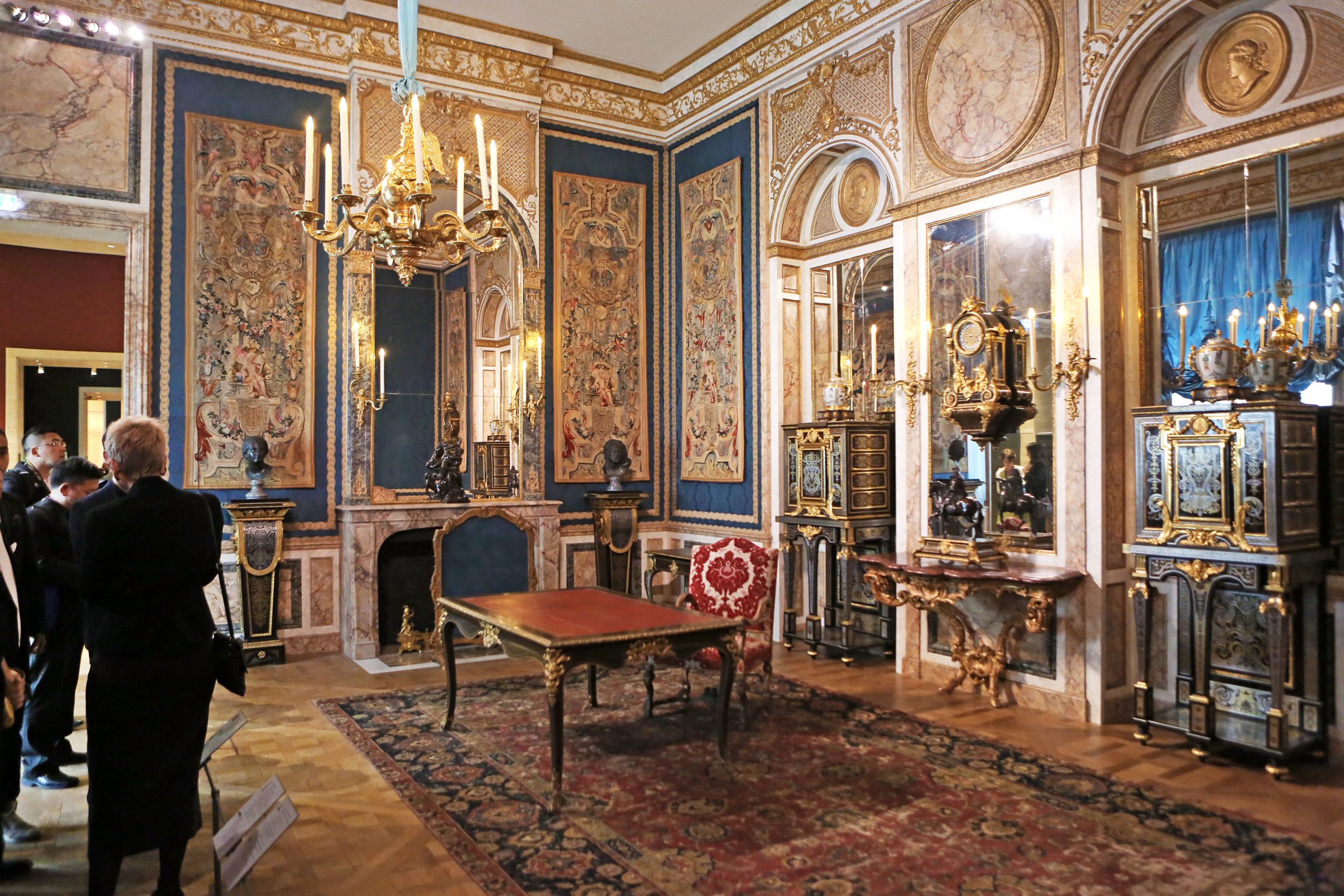 From the dust, glittering Louvre show emerges