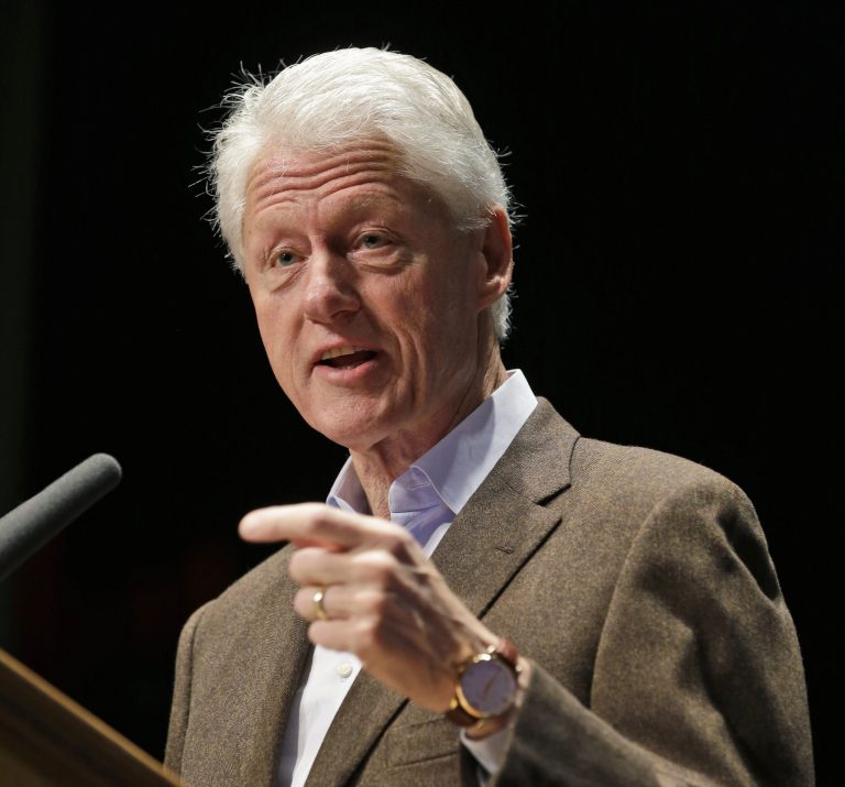 FILE - In this Oct. 30, 2013 file photo, former President Bill Clinton speaks in Charlottesville, Va. Adding pressure to fix the administration's problem-plagued health care program, Clinton says President Barack Obama should find a way to let people keep their health coverage, even if it means changing the law. Clinton says Obama should 