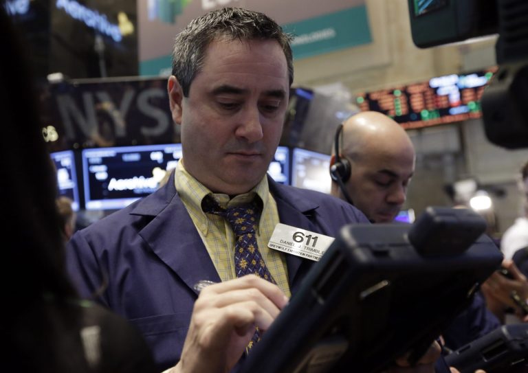 Trader Daniel Trimble works on the floor of the New York Stock Exchange. (AP/Richard Drew)