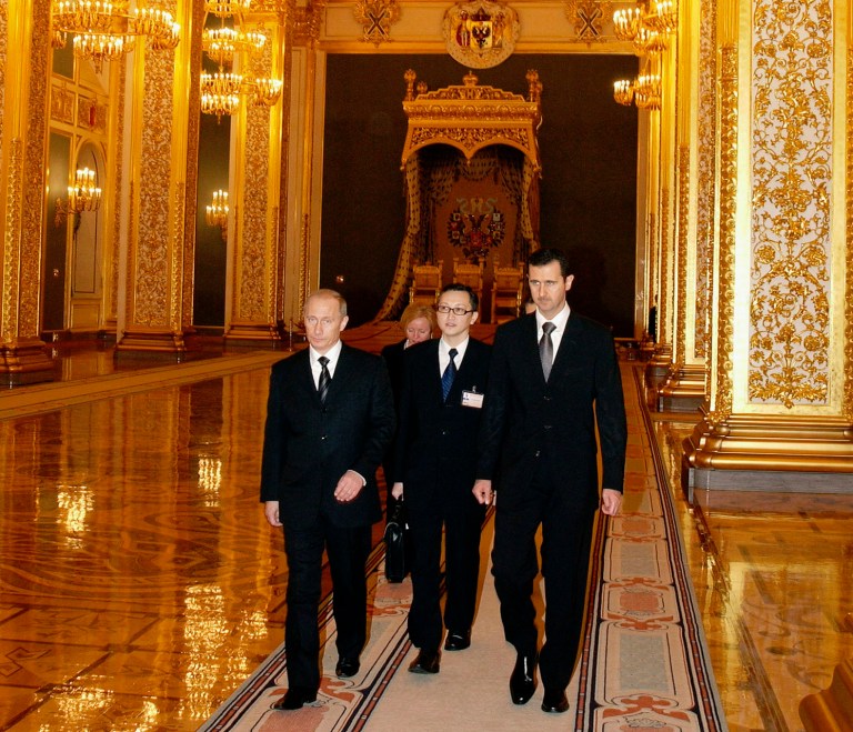   FILE - In this Jan. 25, 2005, file photo Syrian President Bashar Assad, right, and Russian President Vladimir Putin, left, walk during their meeting in the Kremlin in Moscow during for a four-day visit amid Israeli allegations that his government sought to buy Russian missiles. Assad and his father before him have been Moscowâs foremost Arab allies for decades. Currently much of the weaponry Syria deploys against the rebels fighting to the Assad regime comes from Russia. Even as evidence mounts that his military launched the Aug. 21, 2013, chemical attack that the U.S. says killed more than 1,000 people, Russia insists that the rebels used the deadly chemicals. (AP Photo/ITAR-TASS, Presidential Press Service, File)  