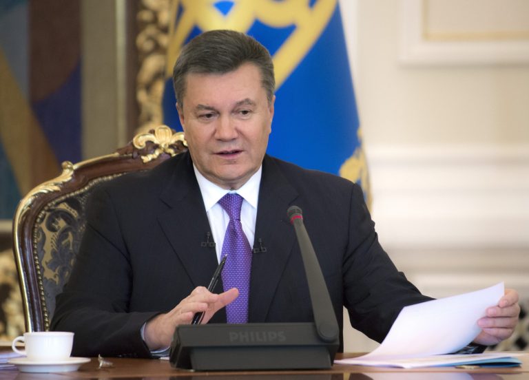 FILE -  In this Thursday, Dec. 19, 2013 file photo Ukrainian President Viktor Yanukovych speaks during a press conference in Kiev, Ukraine. Ukraine's embattled president Viktor Yanukovych is taking sick leave on Thursday, Jan. 30, 2014, as the country's political crisis continues without signs of resolution. A statement on the presidential website Thursday said Yanukovych has an acute respiratory illness and high fever. There was no indication of how long he might be on leave or whether he would be able to do any work. (AP Photo/Mykhailo Markiv, Pool)