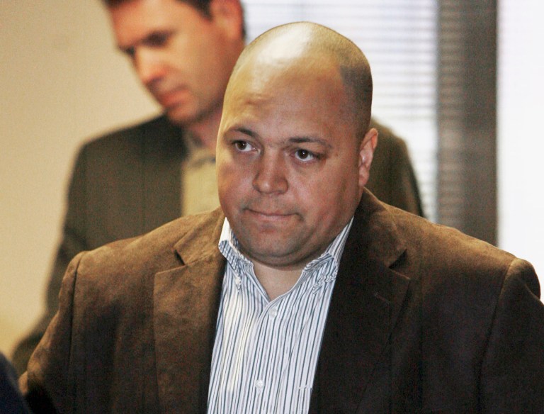 FILE - In this April 24, 2008, file photo, former Illinois State Police trooper Matt Mitchell arrives for a court appearance in Belleville, Ill. Mitchell who lost his driving privileges over a 2007 crash in which he killed two sisters is trying for a fifth time to get his driver's license back. He offered at times a tearful recounting of the southwestern Illinois crash to a hearing officer Wednesday Aug. 13, 2014 in Mount Vernon, Ill. A decision on Mitchell's request could come in 90 days.(AP Photo/Belleville News-Democrat, Derik Holtmann, File)