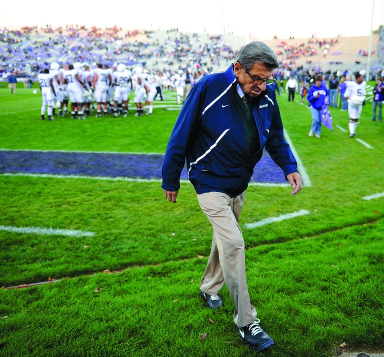FILE - Oct. 22, 2011 file photo, Penn State coach Joe Paterno walks off the field after warmups before Penn State's NCAA college football game against Northwestern in Evanston, Ill. Paterno and other senior Penn State officials 