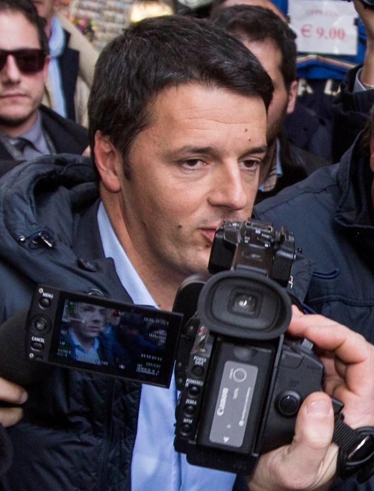 Democratic Party secretary Matteo Renzi arrives to speak at a party leadership meeting to decide whether to yank support from Letta's fragile coalition government, accusing the premier of failing to make progress on key financial reforms, in Rome Thursday, Feb. 13, 2014. Italian Premier Enrico Letta faces a new challenge to his leadership Thursday as the head of his own party tried to orchestrate a power grab. Renzi, 39, has been critical of Letta since December, when Renzi was voted head of their Democratic Party. If successful, Renzi could be tapped to form a new government. (AP Photo/Roberto Monaldo)  ITALY OUT