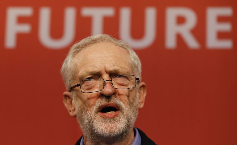 Jeremy Corbyn speaks on stage after he is announced as the new leader of The Labour Party during the Labour Party Leadership Conference in London, Saturday, Sept. 12, 2015. Corbyn will now lead Britain's main opposition party. (AP Photo/Kirsty Wigglesworth)