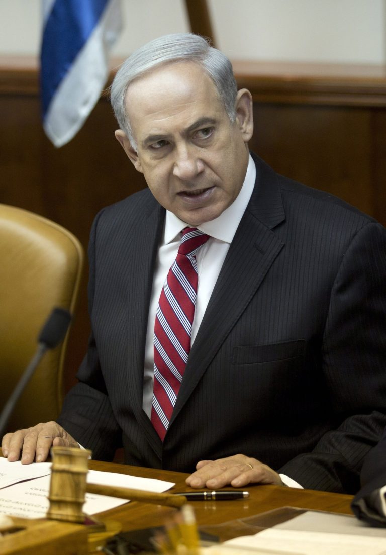 Israeli Prime Minister Benjamin Netanyahu attends the weekly cabinet meeting in his office in Jerusalem, Israel, June 9, 2013. A senior member of Prime Minister Benjamin Netanyahu's Likud Party said in an interview broadcast Sunday that the Israeli government will not accept a Palestinian state with the borders favored by the Palestinians and the international community, a new hurdle to U.S. Secretary of State John Kerry's effort to restart peace talks in his latest visit to the region. Netanyahu's office has tried to distance itself from the comments. (AP Photo/Abir Sultan, Pool)