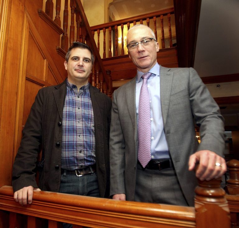 In this Jan. 13 photo, New Hampshire Republican Congressional candidate Dan Innis, right, poses with his partner Doug Palardy, in Portsmouth, N.H. (AP Photo/Jim Cole)