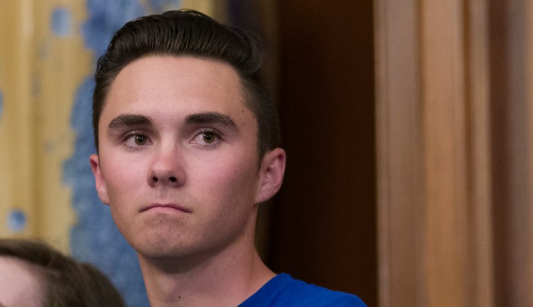 David Hogg, who survived the Stoneman Douglas High School shooting, stands during a news conference to announce the introduction of bipartisan legislation to expand background checks for sales and transfers of firearms, on Capitol Hill, Tuesday, Jan. 8, 2019 in Washington.