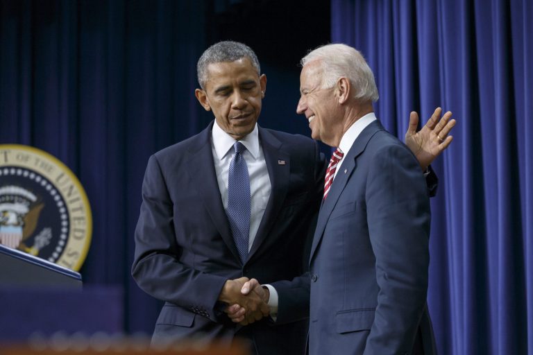 President Barack Obama embraces Vice President Joe Biden, right, before signing the Workforce Innovation and Opportunity Act, bipartisan job-training legislation which aims to help job seekers gain valuable employment skills, at the Eisenhower Executive Office Building in the White House complex in Washington, Tuesday, July 22, 2014. (AP Photo/J. Scott Applewhite)