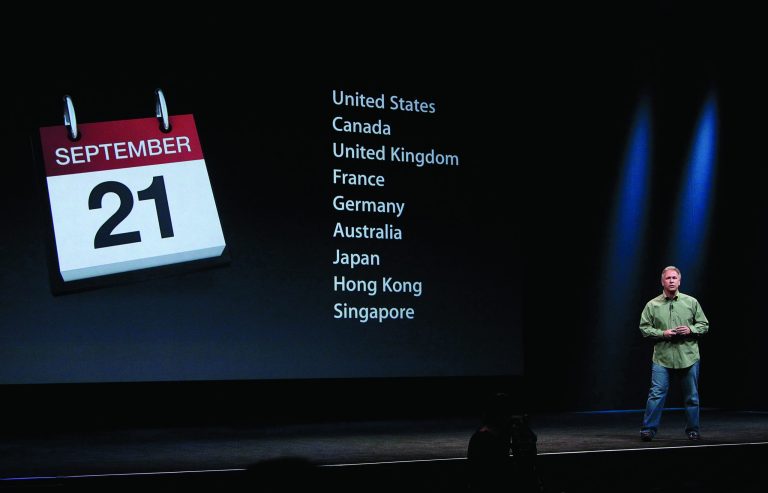 Phil Schiller, Apple's senior vice president of worldwide marketing, gives release dates of the iPhone 5 during an Apple event in San Francisco, Wednesday, Sept. 12, 2012. (AP Photo/Jeff Chiu)