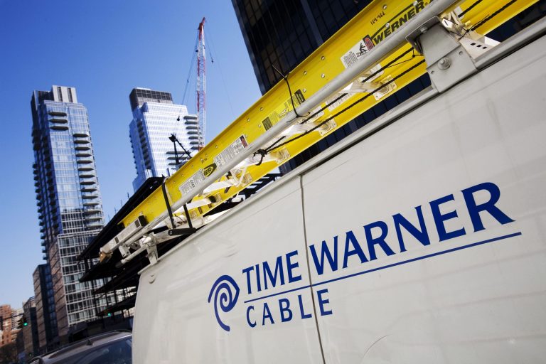 FILE - In this Feb. 2, 2009, file photo, a Time Warner Cable truck is parked in New York. Time Warner Cable says a problem that occurred during routine maintenance caused a nationwide outage of its Internet service for hours, early Wednesday, Aug. 27, 2014. (AP Photo/Mark Lennihan, File)