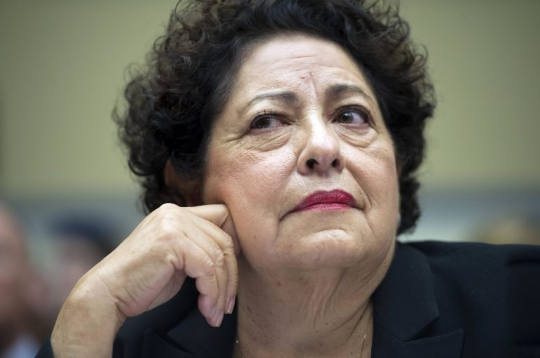 In this June 16, 2015, photo, Office of Personnel Management Director Katherine Archuleta testifies on Capitol Hill in Washington, before the before the House Oversight and Government Reform Committee hearing on the OPM data breach. (AP Photo/Cliff Owen)
