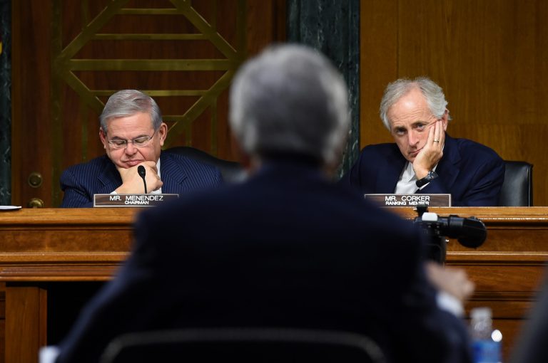 Secretary of State John Kerry, center, testifies on Capitol Hill in Washington before the Senate Foreign Relations Committee hearing on 