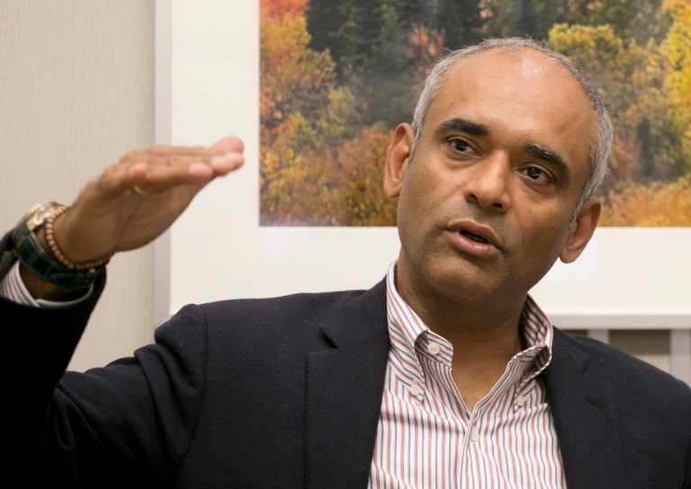 In this Wednesday, March 26, 2014 photo, Chet Kanojia, the founder and CEO of Aereo, speaks during an interview with The Associated Press, in New York. The future of Aereo, an online service that provides over-the-air TV channels, hinges on a battle with broadcasters that goes before the U.S. Supreme Court in late April 2014. (AP Photo/Mark Lennihan)