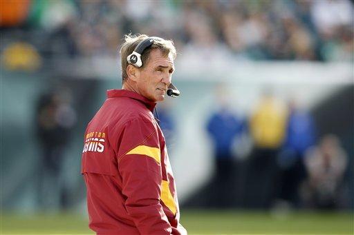 Washington Redskins head coach Mike Shanahan watches during the first half of an NFL football game against the Philadelphia Eagles, Sunday, Jan. 1, 2012, in Philadelphia. (AP Photo/Mel Evans)